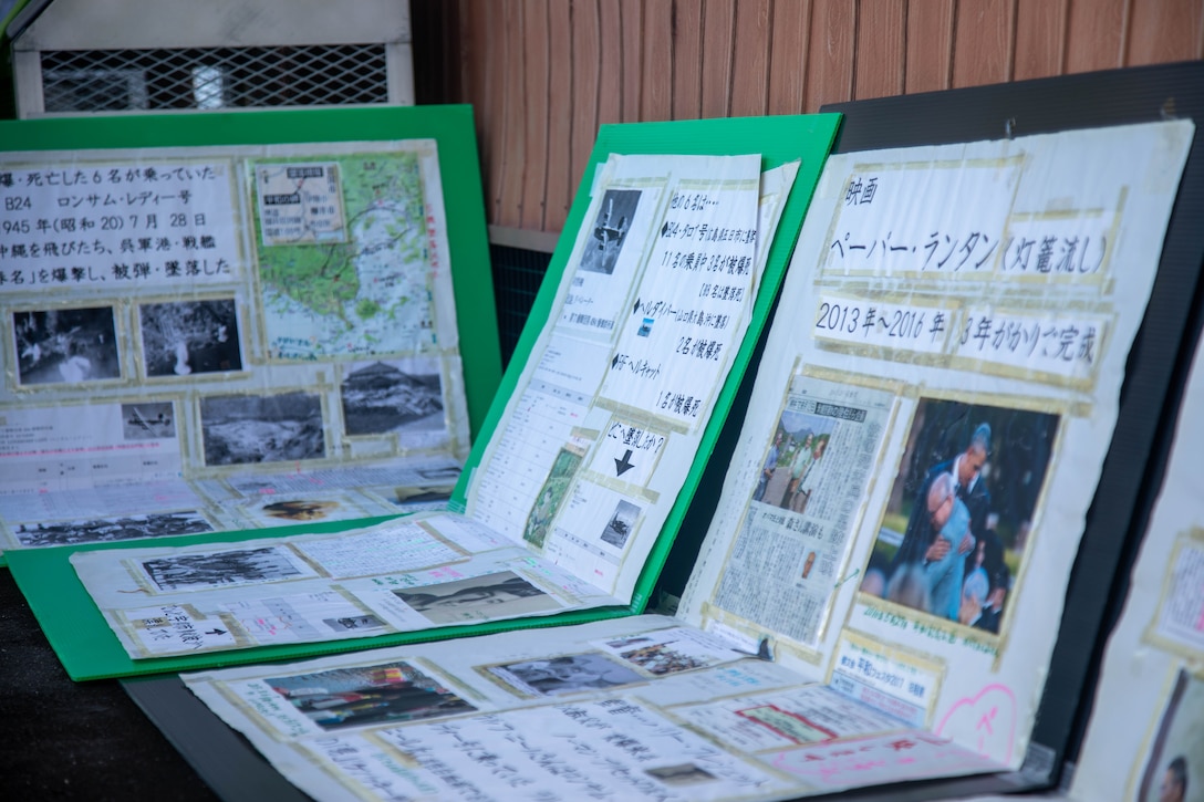 Educational display boards detail the history of the B-24 Liberator aircraft “Lonesome Lady” and its 1945 crash in Ikachi, Japan, during a memorial event in Yanai, Japan, July 28, 2025. Local residents came together to support the memorial in Yanai, Japan, paying tribute to American and Japanese lives lost during World War II. (U.S. Marine Corps photo by Lance Cpl. Micah Taylor)