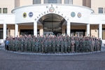 U.S. service members attending the January 2026 Maritime Security Cooperation and Attaché Symposium gather for a group photo at U.S Naval Support Active Naples, Italy, Jan. 12, 2026.