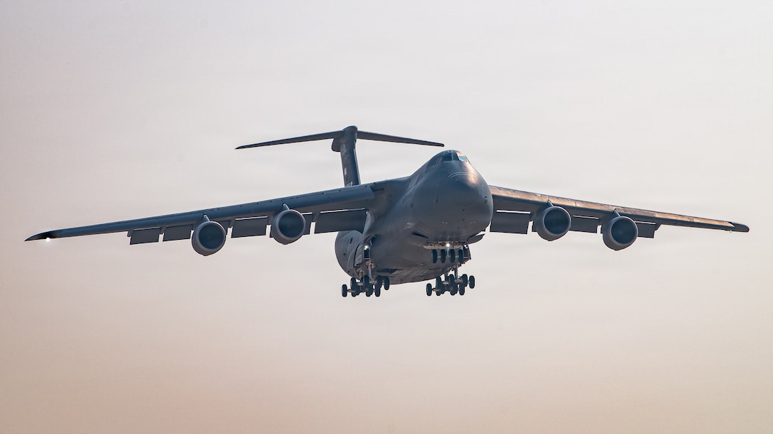 A U.S. Air Force C-5M Super Galaxy aircraft approaches for landing within the U.S. Central Command area of responsibility, Dec. 6, 2025. As the largest aircraft in the U.S. Air Force inventory, it can transport oversized cargo across intercontinental ranges, enabling power projection throughout the region. (U.S. Air Force photo by Tech. Sgt. Justin Norton)