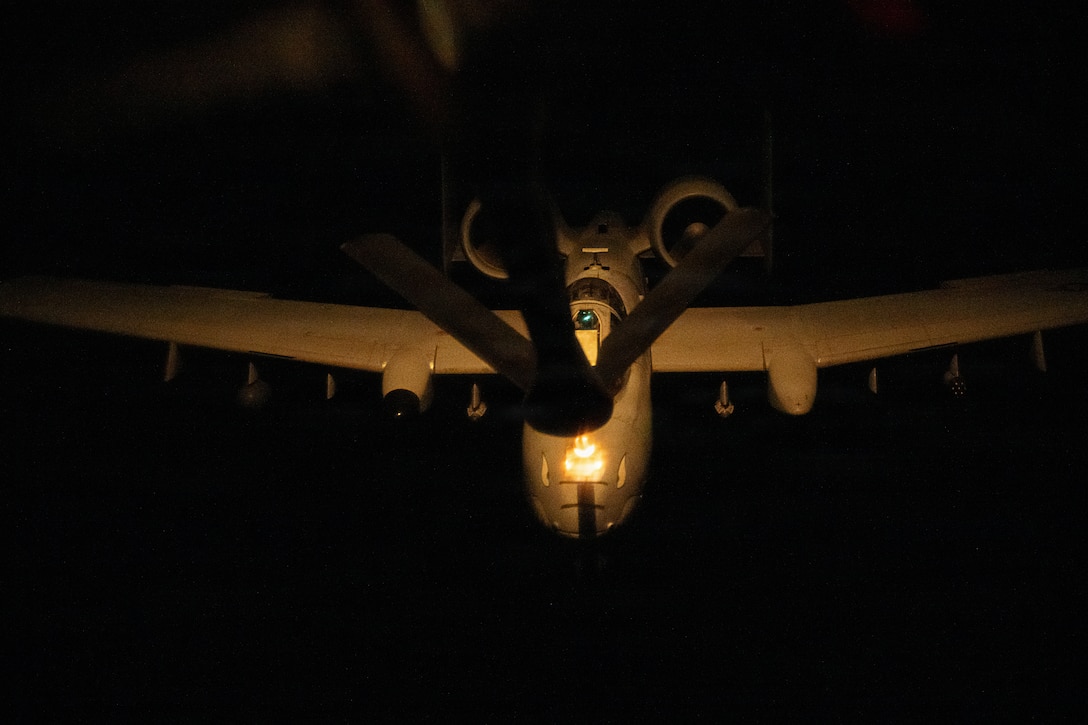 A U.S. Air Force KC-135 Stratotanker aircraft refuels an A-10C Thunderbolt II aircraft over the U.S. Central Command area of responsibility, Nov. 19, 2025. This A-10 provides close air support and deterrence against regional threats throughout the CENTCOM AOR. (U.S. Air Force photo by Tech. Sgt. Nicholas Monteleone)