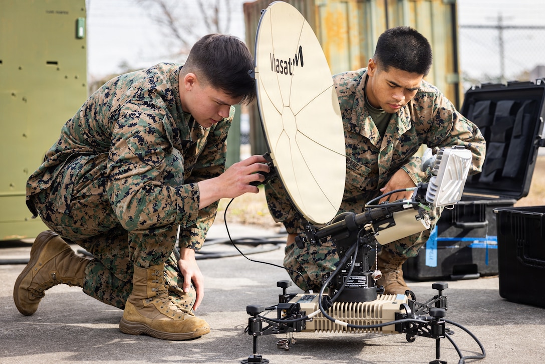 U.S. Marines from around II Marine Expeditionary Force receive training on the Multi-Mission communications terminal during a Commercial Satellite Communication Operator Course at Marine Corps Base Camp Lejeune, Dec. 17, 2025. The purpose of CSOC is to provide knowledge and hands on training with commercial off-the-shelf communication equipment to modernize communication efforts in accordance with Force Design. (U.S. Marine Corps photo by Staff Sgt. Gavin Umboh)