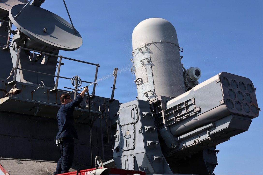 ARABIAN GULF (Jan. 9, 2026) A U.S. Sailor, assigned to the Arleigh Burke-class guided-missile destroyer USS Roosevelt (DDG 80), conduct a fresh water wash down in the Arabian Gulf. Roosevelt is deployed to the U.S. 5th Fleet area of operations to support maritime security and stability in the U.S. Central Command area of responsibility. (U.S. Navy photo by Mass Communication Specialist 1st Class Indra Beaufort)
