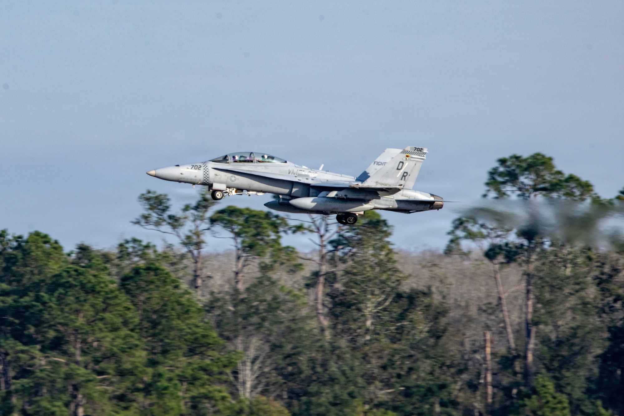 A U.S. Marine Corps F/A-18D Hornet assigned to Marine Fighter Attack Squadron (VMFA) 312 takes off during Combat Search and Rescue Training Exercise 26-1 at Moody Air Force Base, Georgia Jan. 13, 2026. The joint exercise integrated Marine Corps and Air Force aviation assets to practice coordinated flight operations in support of combat search and rescue missions in contested environments. (U.S. Air Force photo by Senior Airman Iain Stanley)