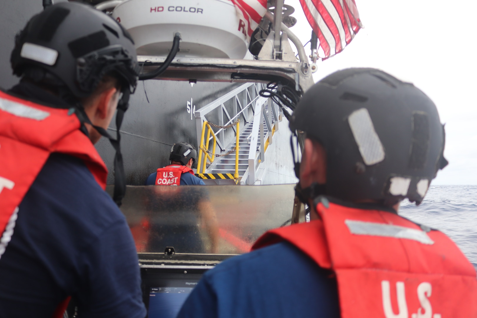 U.S. Coast Guard Cutter Vigilant’s (WMEC 617) small boat crew comes alongside a motor tanker in the Atlantic Ocean, Jan. 7, 2026. Vigilant escorted the motor tanker, which was seized by a Coast Guard tactical boarding team with support from the Department of War, for operating as a vessel without nationality in the Caribbean Sea.