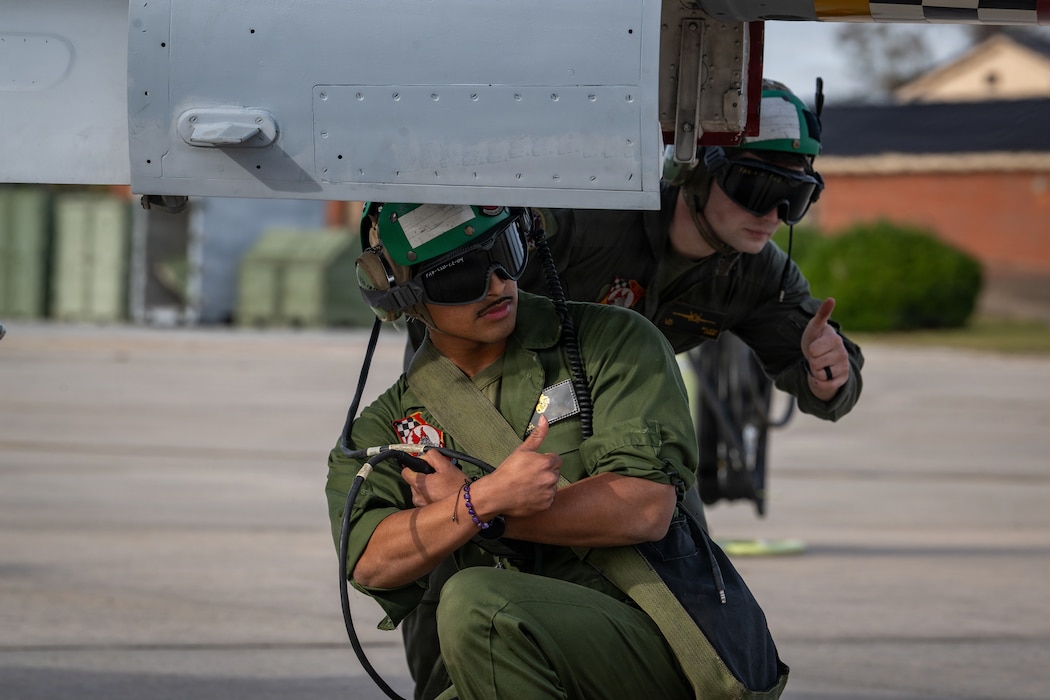 U.S. Marine Corps airframes mechanics assigned to Marine Fighter Attack Squadron 312 give a thumbs up during Combat Search and Rescue Training Exercise 26-1 at Moody Air Force Base, Georgia Jan. 12, 2026. CSARTE 26-1 emphasized joint planning and execution of flight operations supporting personnel recovery missions. (U.S. Air Force photo by Senior Airman Iain Stanley)