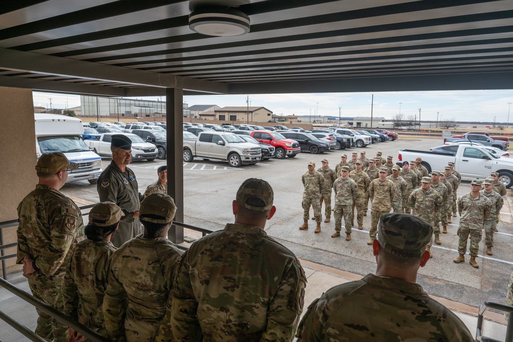 U.S. Air Force Maj. Gen. Ty Neuman, Eighth Air Force and Joint-Global Strike Operations Center commander, speaks with Airmen assigned to the 28th Bomb Squadron at Dyess Air Force Base, Texas, Jan. 13, 2026. Neuman and Wolfgang visited Dyess to ensure the current  facilities are sufficient for continued use of the B-1 Lancer. (U.S. Air Force photo by Airman 1st Class Caleb Schellenberg)