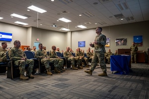 U.S. Air Force Chief Master Sgt. Josh Moore, command chief, Air National Guard, speaks to graduates of the Chief Master Sergeant Orientation Course (CMSOC) on January 9, 2026, at McGhee Tyson Air National Guard Base, Tennessee. The I.G. Brown Training and Education Center hosted the CMSOC, which provides newly selected chief master sergeants with advanced leadership education and a strategic-level perspective. (U.S. Air National Guard photo by Master Sgt. Teri Eicher)