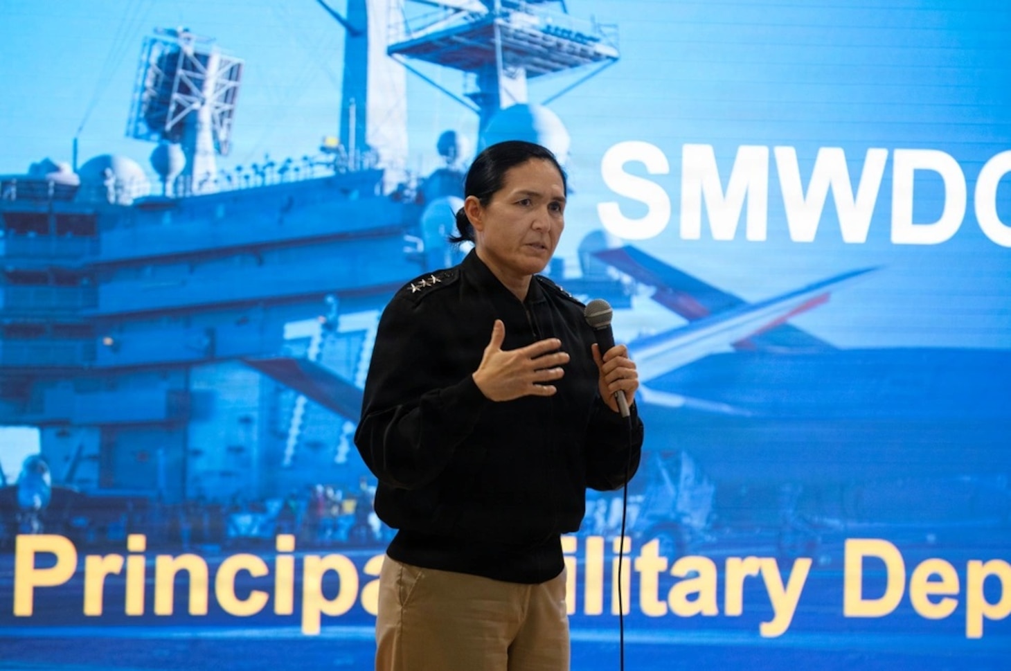 Vice Adm. Seiko Okano delivers remarks during WTI Re-Blue