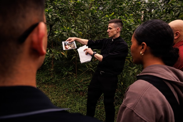 U.S. Marines and Sailors with the 31st Marine Expeditionary Unit, look at photos during a tour of a battlefield in an area formerly known as the Que Son Valley near Da Nang, Vietnam, Jan. 10, 2026. Marines and Sailors visited this battle site to honor and show reverence for the service members who fought in the Vietnam War. The 31st MEU, the Marine Corps’ only continuously forward-deployed MEU, provides a flexible and lethal force ready to perform a wide range of military operations as the premiere crisis response force in the Indo-Pacific region. (U.S. Marine Corps photo by Lance Cpl. Victor Gurrola)