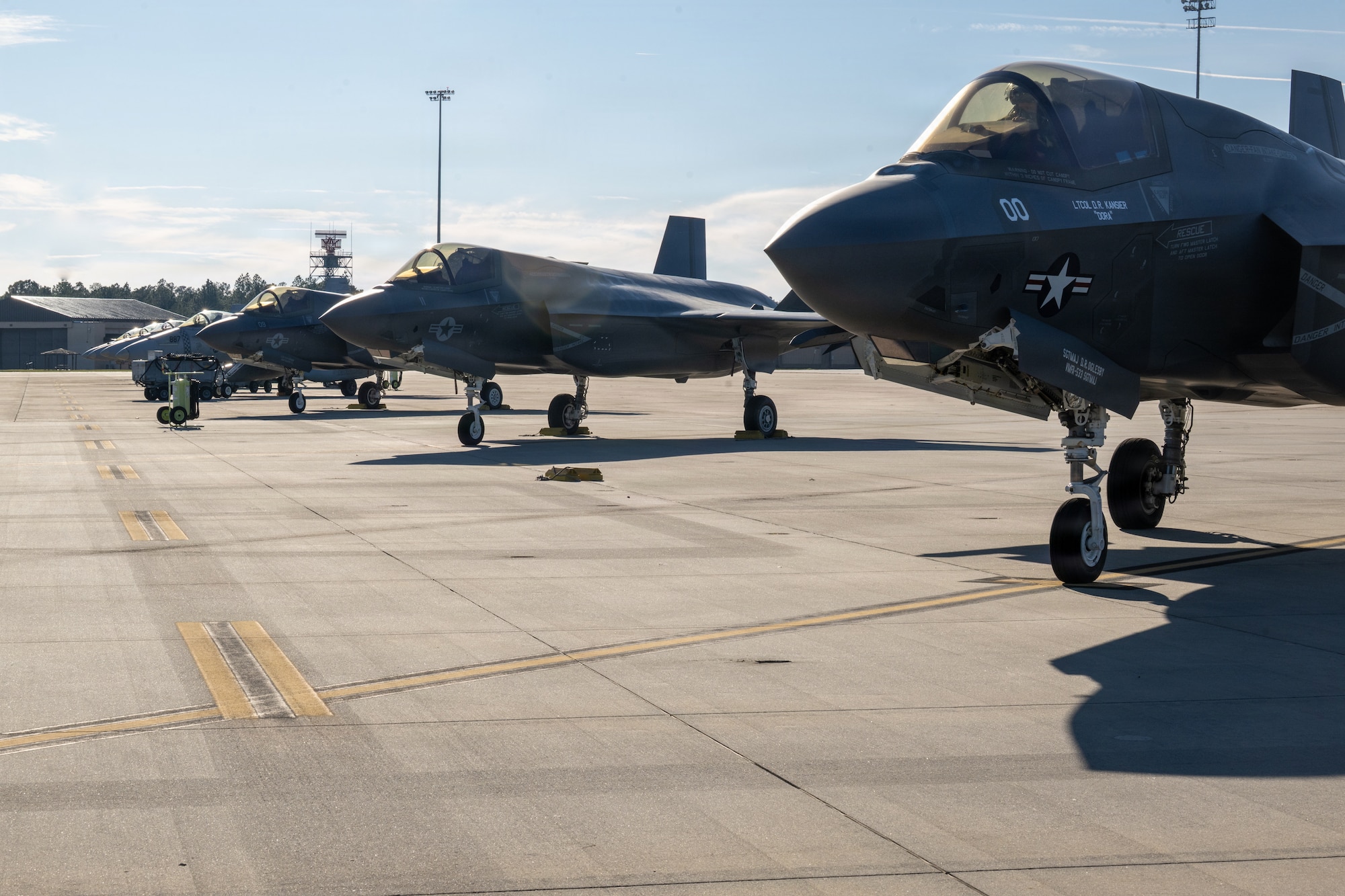 U.S. Marine Corps F-35B Lightning II and F-18C/D Hornet models are parked on the flightline during a Combat Search and Rescue Training Exercise at Moody Air Force Base, Georgia Jan. 13, 2026. The joint exercise integrated Marine Corps and Air Force aviation assets to rehearse coordinated flight operations in support of combat search and rescue missions in contested environments. (U.S. Air Force photo by Senior Airman Iain Stanley)