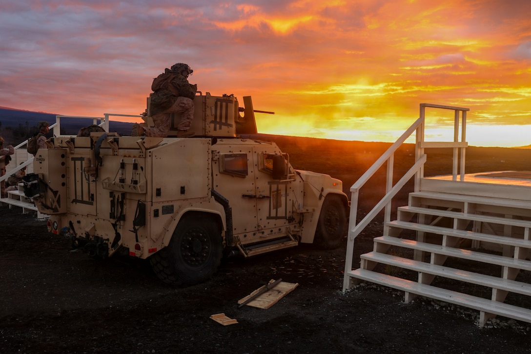 U.S. Marine Corps Sgt. Andrew Montpetit, a machine gunner with 3rd Littoral Combat Team, 3rd Marine Littoral Regiment, 3rd Marine Division, adjusts fire on a M2 .50 caliber machine gun during a live-fire training event at Pohakuloa Training Area, Hawaii, Jan. 15, 2026.