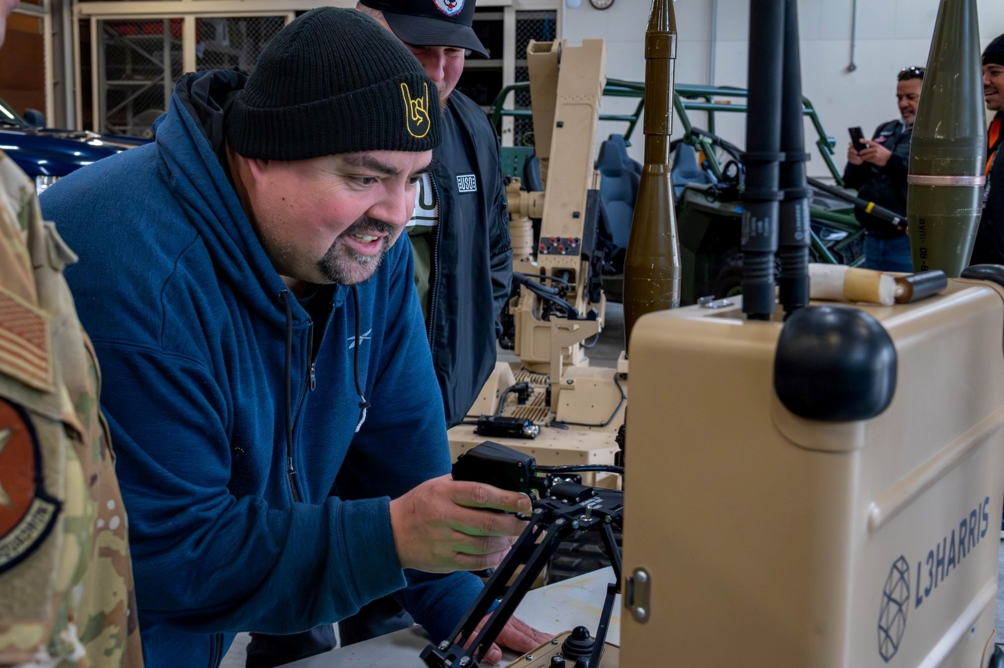 Comedian Gabriel “Fluffy” Iglesias, interacts with a Recovery of Airbase Denied By Ordinance control panel while touring the 35th Civil Engineer Squadron Explosive Ordnance Disposal flight at Misawa Air Base, Japan, Jan. 17, 2026.