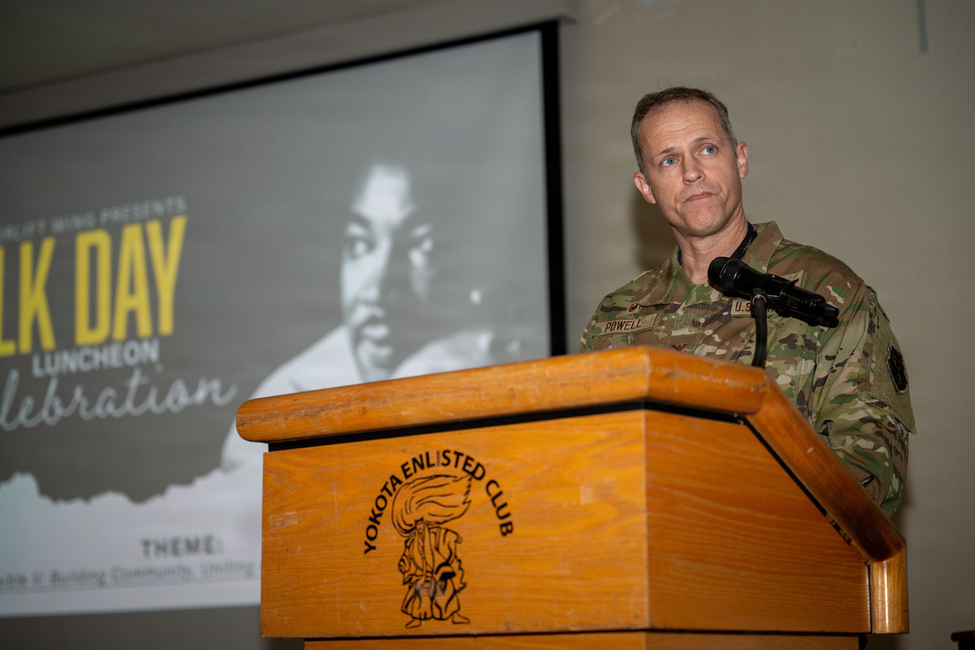 Airman delivers remarks during ceremony.
