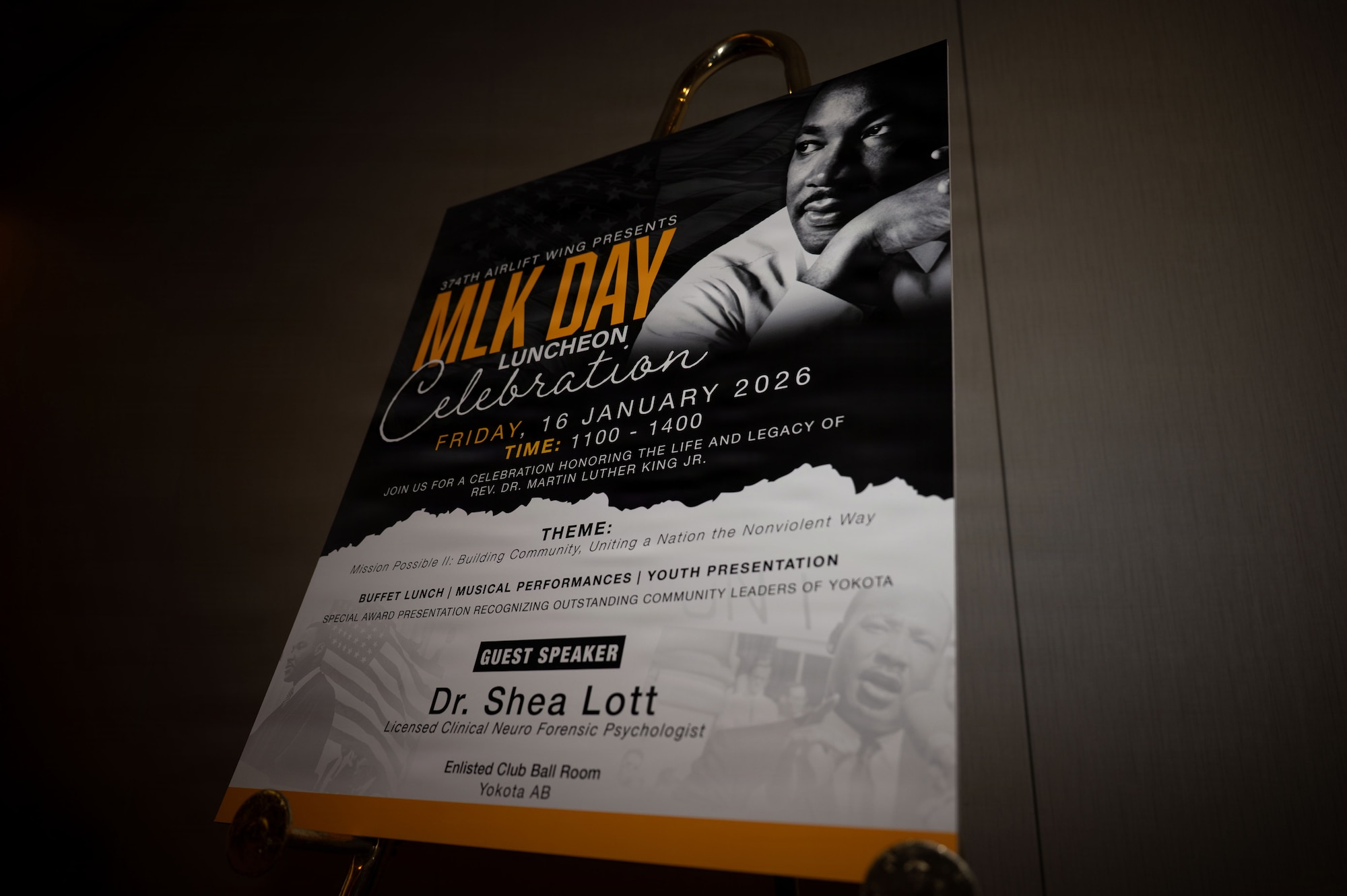 A sign sits at ceremony.