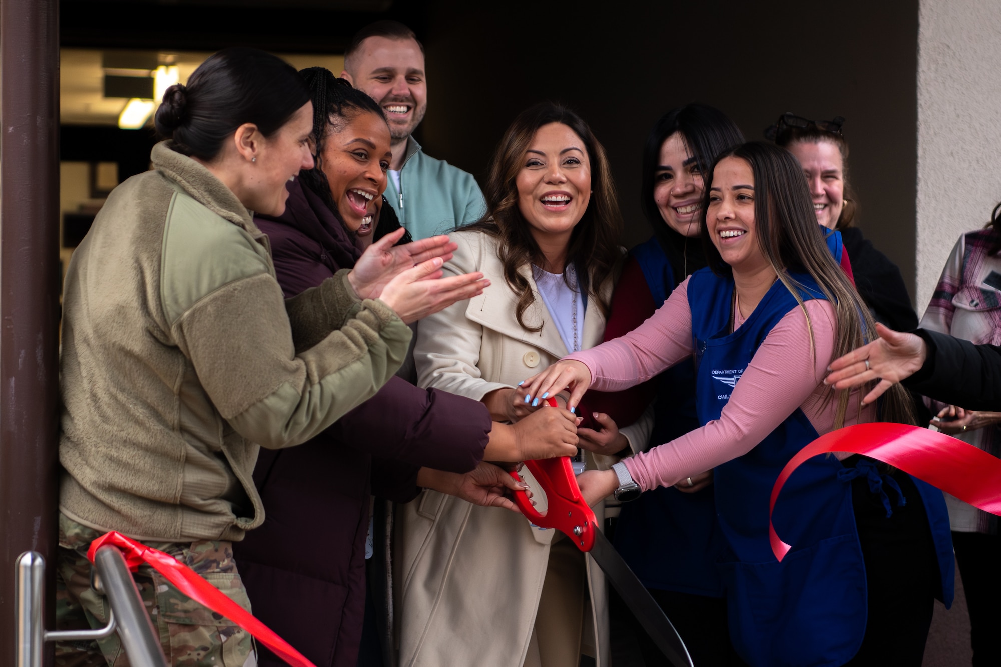 U.S. Air Force Lt. Col. Katherine Kuc, 86th Force Support Squadron commander, and Ramstein Child Development Center team members cut the ceremonial ribbon at the newly opened CDC infant rooms at Ramstein Air Base, Germany, Jan 20. 2026.