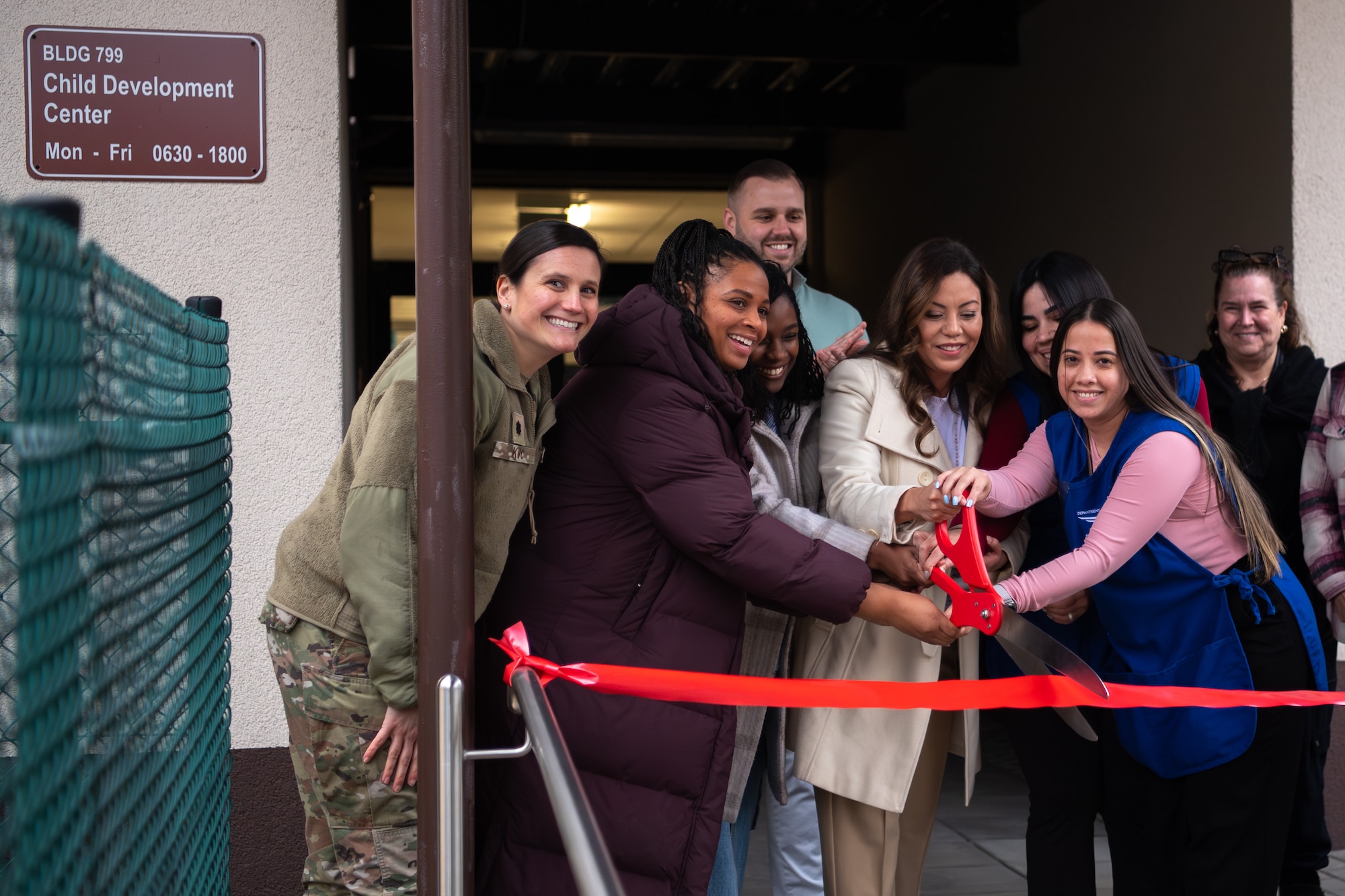 U.S. Air Force Lt. Col. Katherine Kuc, 86th Force Support Squadron commander, and Ramstein Child Development Center team members cut the ceremonial ribbon at the newly opened CDC infant rooms at Ramstein Air Base, Germany, Jan 20. 2026.