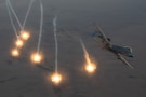 A U.S. Air Force A-10C Thunderbolt II aircraft dispenses flares during a mission within the U.S. Central Command area of responsibility, Jan. 5, 2026. The A-10 conducts operations across the AOR to provide close air support and combat airpower as necessary. (U.S. Air Force photo by Airman 1st Class Travis Knauss)