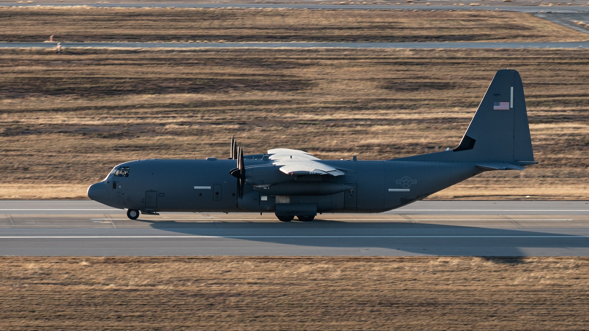 A U.S. Air Force C-130J Super Hercules equipped with external fuel tanks  assigned to the 317th Airlift Wing prepares for departure during a Maximum Endurance Operation in support of Exercise Palmetto Reach at Dyess Air Force Base, Texas, Jan. 12, 2026. The 317th AW employed the MEO to rapidly project tactical airlift capabilities into the Indo-Pacific while supporting Joint Base Charleston’s Combat Readiness Exercise. (U.S. Air Force photo by Senior Airman Jade M. Caldwell)