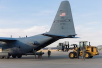 Airmen assigned to the 139th Airlift Wing use a forklift to load cargo on a C-130H Hercules aircraft during a combat readiness inspection at Rosecrans Air National Guard Base, St. Joseph, Mo., Jan. 9, 2026.