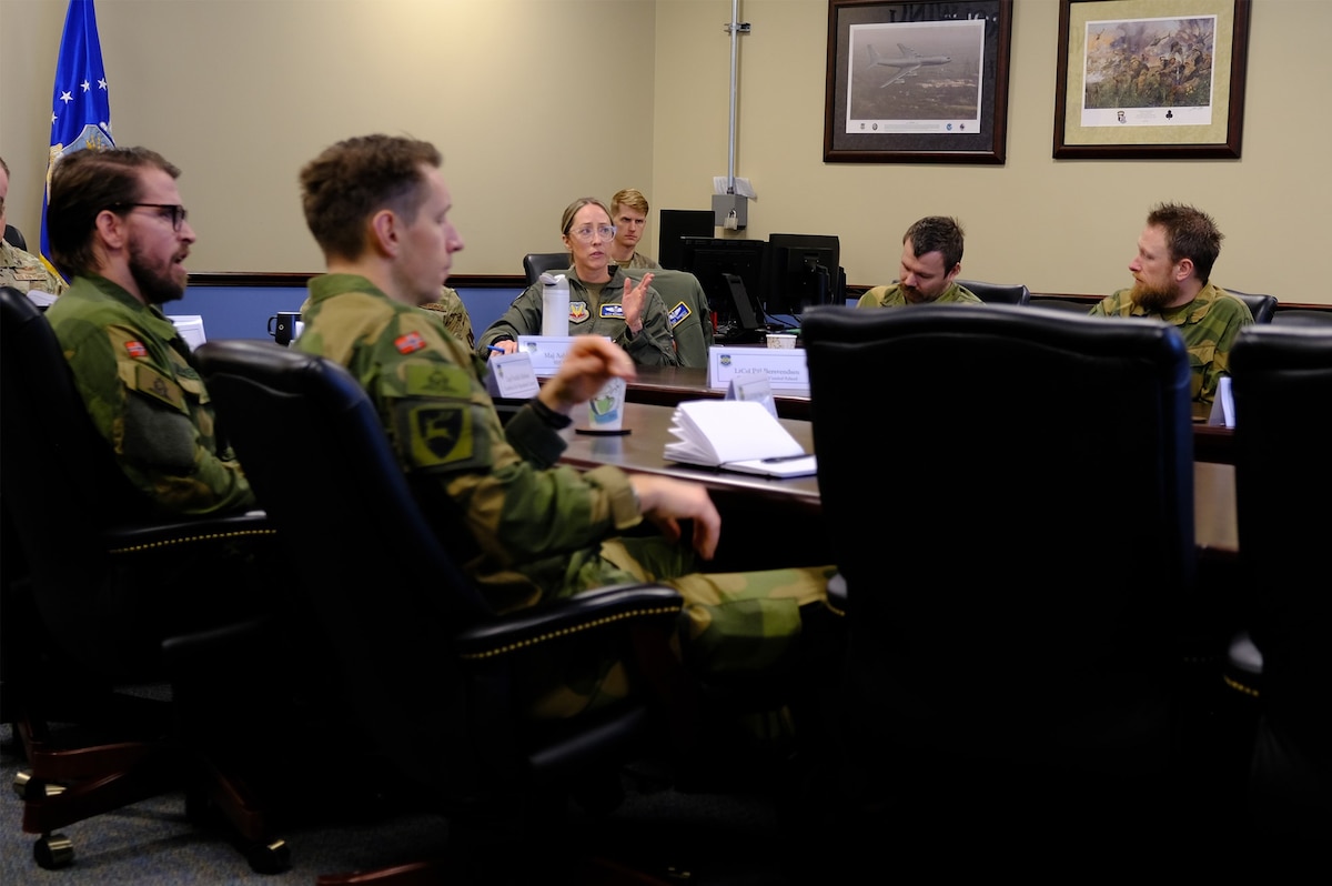 photo US Air Force Airmen and Royal Norwegian Air Force members standing and talking