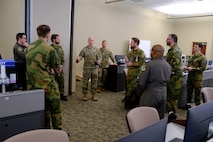photo US Air Force Airmen and Royal Norwegian Air Force members standing and talking
