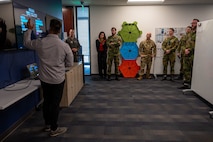 photo US Air Force Airmen and Royal Norwegian Air Force members standing and talking