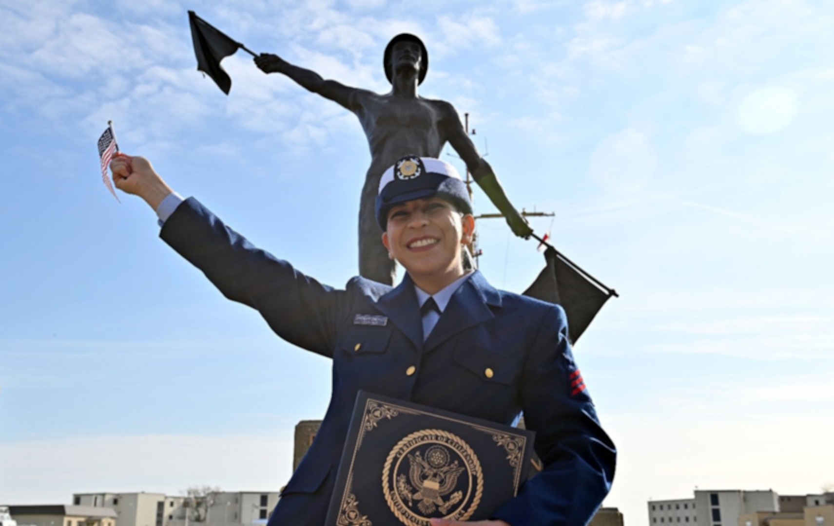 Petty Officer Third Class Melissa Chaparro Santillan holds her certificate of U.S. citizenship at U.S. Coast Guard Training Center (TRACEN) Cape May, December 13, 2024 (U.S. Coast Guard Photo Courtesy of Petty Officer Second Class Christopher Biggs).