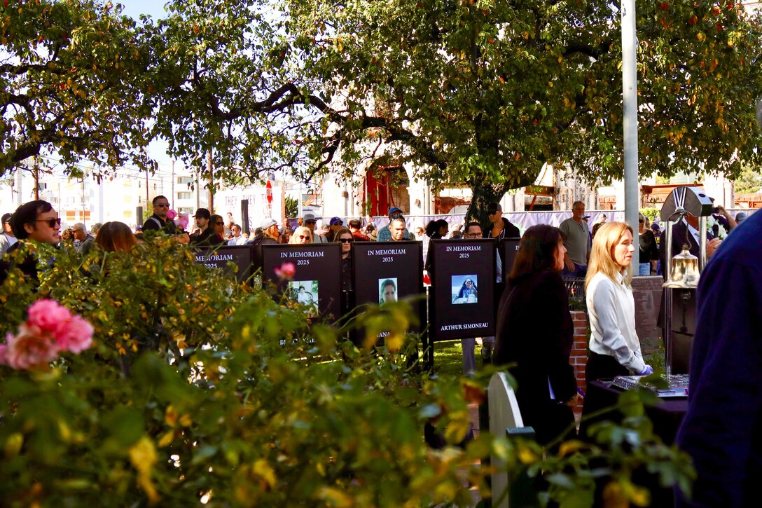 Tribute Placards are presented on easels Jan. 7 as the Palisades community rallies around Village Green after a procession, as a bell tolled 12 times for those lost in the wildfires. (Photo by Shawn Davis, USACE LA District Public Affairs)