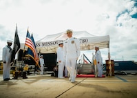 JOINT BASE PEARL HARBOR-HICKAM, Hawaii (Nov. 19, 2025) - Cmdr. Michael Humara, commanding officer of Virginia-class fast-attack submarine USS Missouri (SSN 780), departs the change of command ceremony for Missouri at Joint Base Pearl Harbor-Hickam, Hawaii, Nov. 19, 2025. Missouri is assigned to Submarine Squadron 7 and is capable of supporting various missions, including anti-submarine warfare, anti-surface ship warfare, strike warfare, special operations forces support, and intelligence, surveillance, and reconnaissance. (U.S. Navy photo by Mass Communication Specialist 2nd Class Nicholas Russell)