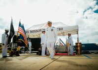 JOINT BASE PEARL HARBOR-HICKAM, Hawaii (Nov. 19, 2025) - Cmdr. Michael Humara, commanding officer of Virginia-class fast-attack submarine USS Missouri (SSN 780), departs the change of command ceremony for Missouri at Joint Base Pearl Harbor-Hickam, Hawaii, Nov. 19, 2025. Missouri is assigned to Submarine Squadron 7 and is capable of supporting various missions, including anti-submarine warfare, anti-surface ship warfare, strike warfare, special operations forces support, and intelligence, surveillance, and reconnaissance. (U.S. Navy photo by Mass Communication Specialist 2nd Class Nicholas Russell)