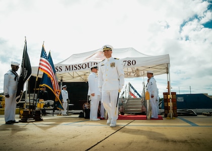 JOINT BASE PEARL HARBOR-HICKAM, Hawaii (Nov. 19, 2025) - Cmdr. Michael Humara, commanding officer of Virginia-class fast-attack submarine USS Missouri (SSN 780), departs the change of command ceremony for Missouri at Joint Base Pearl Harbor-Hickam, Hawaii, Nov. 19, 2025. Missouri is assigned to Submarine Squadron 7 and is capable of supporting various missions, including anti-submarine warfare, anti-surface ship warfare, strike warfare, special operations forces support, and intelligence, surveillance, and reconnaissance. (U.S. Navy photo by Mass Communication Specialist 2nd Class Nicholas Russell)