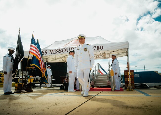 JOINT BASE PEARL HARBOR-HICKAM, Hawaii (Nov. 19, 2025) - Cmdr. Michael Humara, commanding officer of Virginia-class fast-attack submarine USS Missouri (SSN 780), departs the change of command ceremony for Missouri at Joint Base Pearl Harbor-Hickam, Hawaii, Nov. 19, 2025. Missouri is assigned to Submarine Squadron 7 and is capable of supporting various missions, including anti-submarine warfare, anti-surface ship warfare, strike warfare, special operations forces support, and intelligence, surveillance, and reconnaissance. (U.S. Navy photo by Mass Communication Specialist 2nd Class Nicholas Russell)