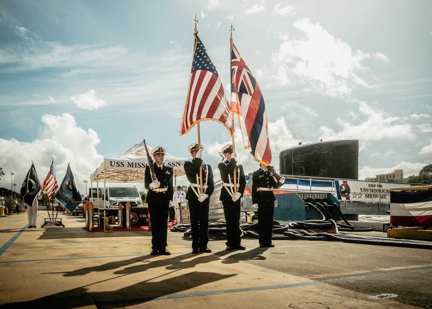 JOINT BASE PEARL HARBOR-HICKAM, Hawaii (Nov. 19, 2025) – Members of Admiral Arthur W. Radford High School Naval Junior Reserve Officer Training Corps color guard present the colors during a change of command ceremony for Virginia-class fast-attack submarine USS Missouri (SSN 780) at Joint Base Pearl Harbor-Hickam, Hawaii, Nov. 19, 2025. Missouri is assigned to Submarine Squadron 7 and is capable of supporting various missions, including anti-submarine warfare, anti-surface ship warfare, strike warfare, special operations forces support, and intelligence, surveillance, and reconnaissance. (U.S. Navy photo by Mass Communication Specialist 2nd Class Nicholas Russell)