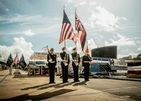 JOINT BASE PEARL HARBOR-HICKAM, Hawaii (Nov. 19, 2025) – Members of Admiral Arthur W. Radford High School Naval Junior Reserve Officer Training Corps color guard present the colors during a change of command ceremony for Virginia-class fast-attack submarine USS Missouri (SSN 780) at Joint Base Pearl Harbor-Hickam, Hawaii, Nov. 19, 2025. Missouri is assigned to Submarine Squadron 7 and is capable of supporting various missions, including anti-submarine warfare, anti-surface ship warfare, strike warfare, special operations forces support, and intelligence, surveillance, and reconnaissance. (U.S. Navy photo by Mass Communication Specialist 2nd Class Nicholas Russell)