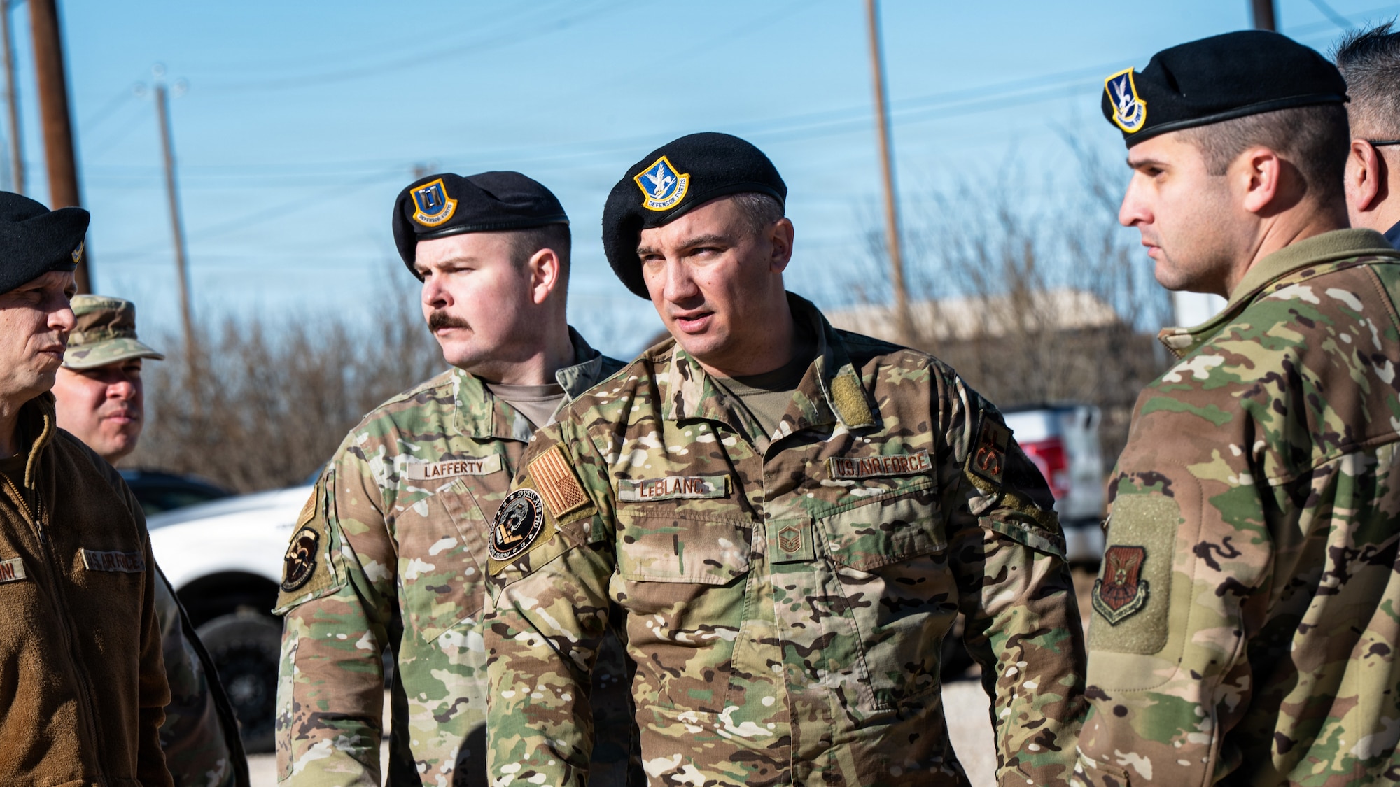 From left, Capt. Kyle Lafferty, 5th Security Forces Squadron operations and training flight officer, Minot Air Force Base, North Dakota; Master Sgt. David LeBlanc and Tech. Sgt. Anthony Bailey, both assigned to Air Force Global Strike Command B-21 Raider Program Integration Office, conduct a site survey at Dyess Air Force Base, Texas, Jan. 14, 2026. The multi-day nuclear summit focused on infrastructure planning related to the B-21 Raider beddown.  (U.S. Air Force photo by Senior Airman Jade M. Caldwell)