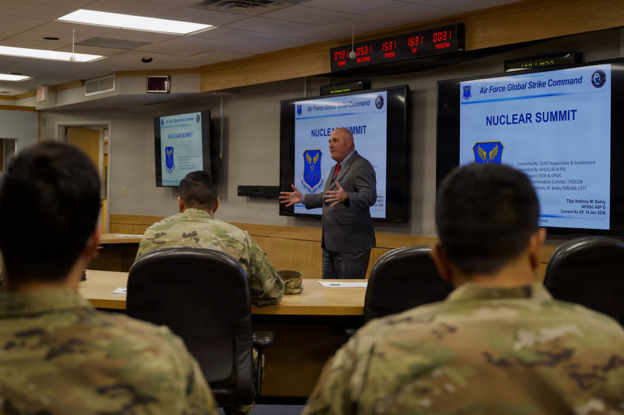 William Beuschel, Dyess Air Force Base B-21 Raider Program Integration Office deputy chief, briefs attendees on goals and objectives related to the B-21 beddown at Dyess AFB, Texas, Jan. 15, 2026. During the multi-day nuclear summit, attendees received briefings on contracting requirements, project timelines and expectations for major construction projects as part of a long-term modernization plan to prepare Dyess for the B-21 while sustaining ongoing B-1B Lancer and C-130J Super Hercules operations.(U.S. Air Force photo by Senior Airman Emma Anderson)