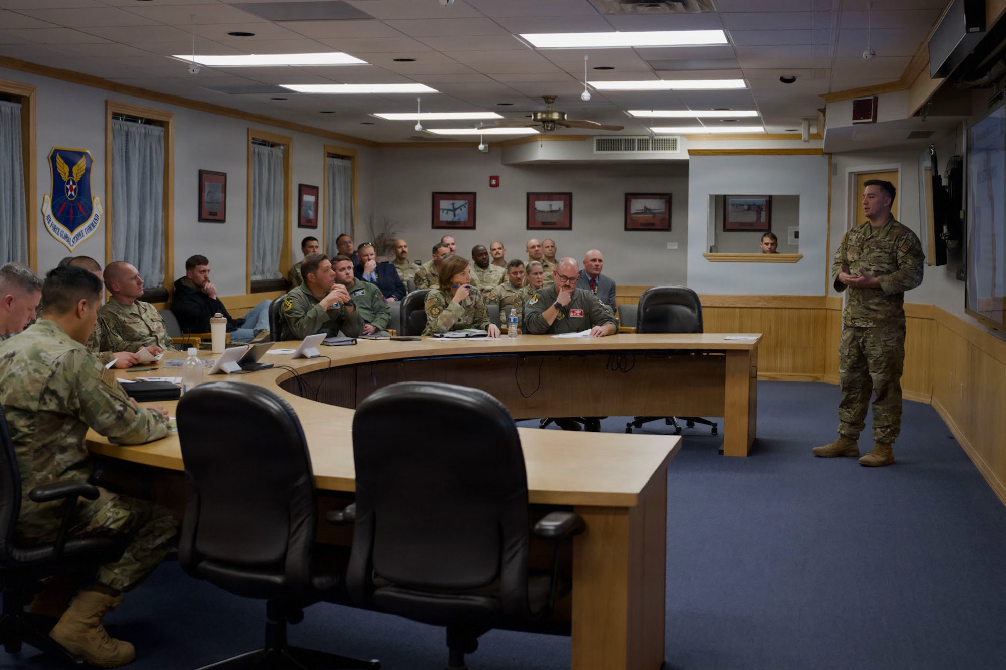 U.S. Air Force Master Sgt. David LeBlanc, Air Force Global Strike Command B-21 Raider Program Integration Office security forces member, provides a briefing during the B-21 Raider Nuclear Summit at Dyess Air Force Base, Texas, Jan. 15, 2026. The strategy for B-21 beddown at Dyess is designed to minimize operational impacts and maximize the reuse of existing facilities at Dyess. (U.S. Air Force photo by Senior Airman Emma Anderson)