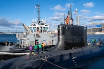 Sailors from the Virginia-class attack submarine USS Texas (SSN 775) pull in line from a tugboat as the submarine prepares to depart Portsmouth Naval Shipyard in Kittery, Maine, to conduct sea trials after receiving critical repairs and system upgrades vital to extending the submarine’s service life and ensuring the Navy’s long-term fleet readiness, Dec. 6, 2024.