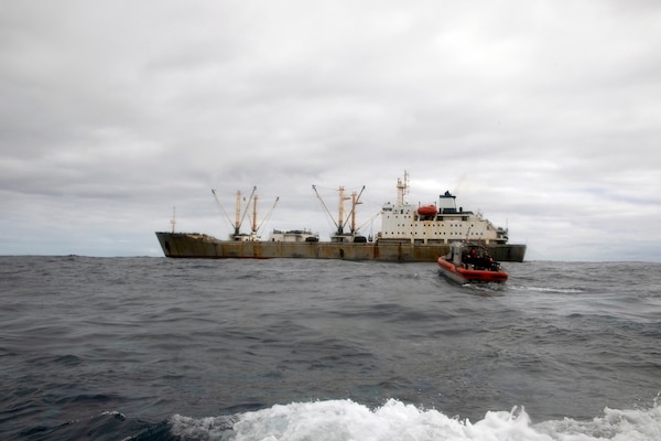 U.S. Coast Guard members conduct a boarding of a fishing vessel in the Eastern Pacific, August 3, 2022. The Coast Guard completed a counter-illegal, unreported and unregulated (IUU) fishing operation for the first time under the South Pacific Regional Fisheries Management Organization (SPRFMO). The SPRFMO convention area covers nearly a fourth of the Earth’s high seas. The SPRFMO Commission consists of 16 members from Asia, Europe, the Americas, and Oceania as well as three cooperating non-contracting parties.