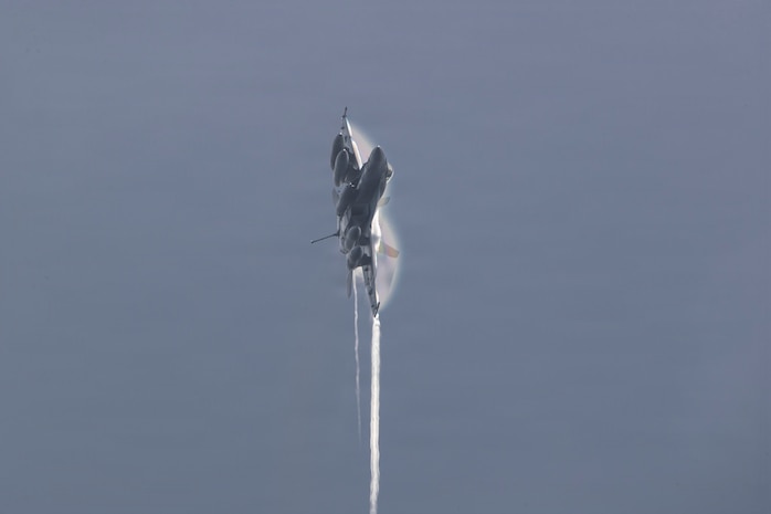 An F/A-18E Super Hornet, attached to Strike Fighter Squadron (VFA) 151, flies over Nimitz-class aircraft carrier USS Abraham Lincoln (CVN 72) on Jan. 15, 2026.