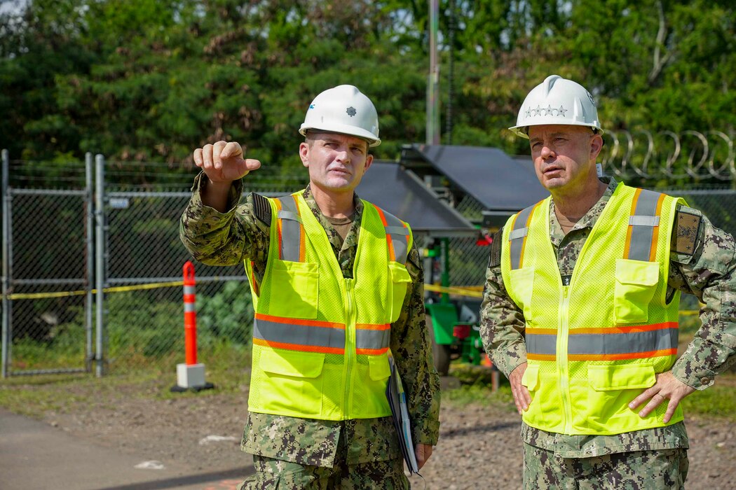 Vice Chief of Naval Operations Adm. Jim Kilby speaks with speaks with Cmdr. Benjamin Dunn, environment and remediation, Navy Closure Task Force-Red Hill (NCTF-RH), while visiting Joint Base Pearl Harbor-Hickam, Hawaii, Jan. 20, 2026. His visit reinforces the Navy’s commitment to the safe and expeditious decommissioning of the Red Hill Bulk Fuel Storage Facility. Kilby visited Hawaii to tour Pearl Harbor Naval Shipyard, NCTF-RH, and Joint Base Pearl Harbor-Hickam; engage with Sailors; and meet with leadership to discuss the strategic importance of the region, Sailor Quality of Service, and Navy readiness.  (U.S. Navy photo by Mass Communication Specialist 2nd Class Krystal Diaz)