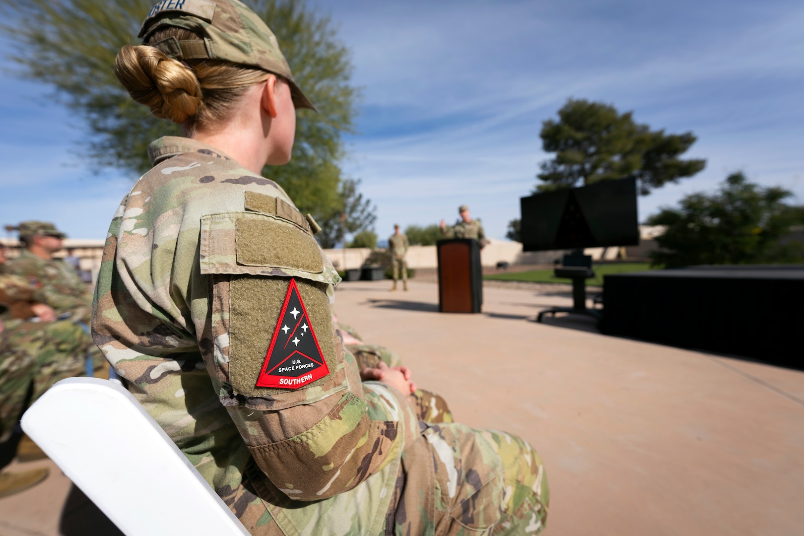 A U.S. Space Force Guardian attends an activation ceremony for Space Forces Southern at Davis-Monthan Air Force Base, Arizona, Jan. 21, 2026. SPACEFOR–SOUTH became operational effective Dec. 1, 2025, the ceremony formally recognized the activation with the assumption of command by Col. Brandon P. Alford, and the digital unveiling of the Space Forces Southern emblem, symbolizing the command’s mission and regional focus. (U.S. Air Force photo by Tech. Sgt. Rachel Maxwell)
