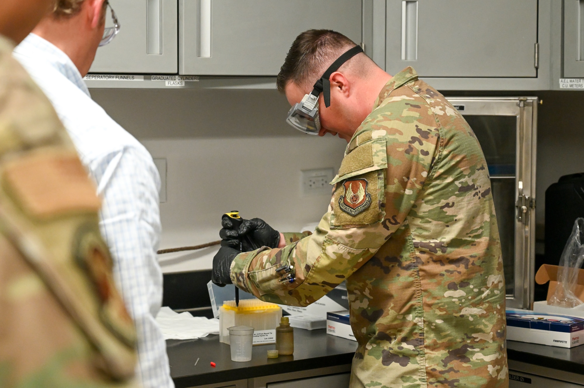 Staff Sgt. Andrew Whitmire, 75th Logistics Readiness Squadron fuels flight, practices using a prototype hydraulic fluid testing device Oct. 27, 2025, at Hill Air Force Base, Utah. The Air Force Petroleum Office, the single enterprise manager for petroleum and aerospace energy, is partnering with the 75th LRS at Hill AFB to develop a prototype that will significantly reduce the time it takes to test jet fuel for contamination from PAO and aviation-grade hydraulic fluid. (U.S. Air Force photo by 1st Lt. Rachel Shaffer)