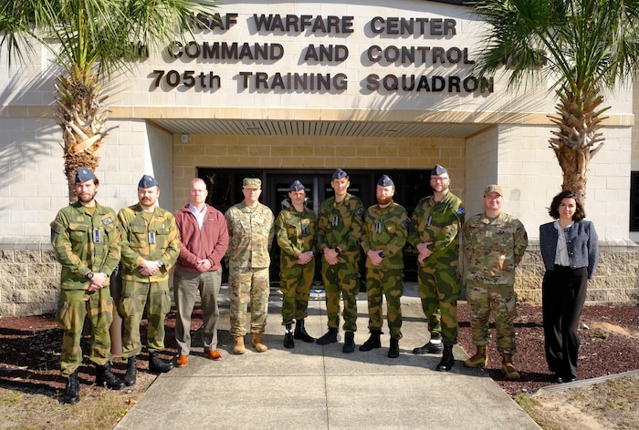 photo US Air Force Airmen and Royal Norwegian Air Force members standing and talking