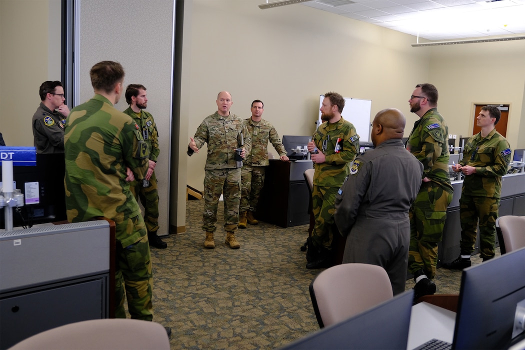 photo US Air Force Airmen and Royal Norwegian Air Force members standing and talking