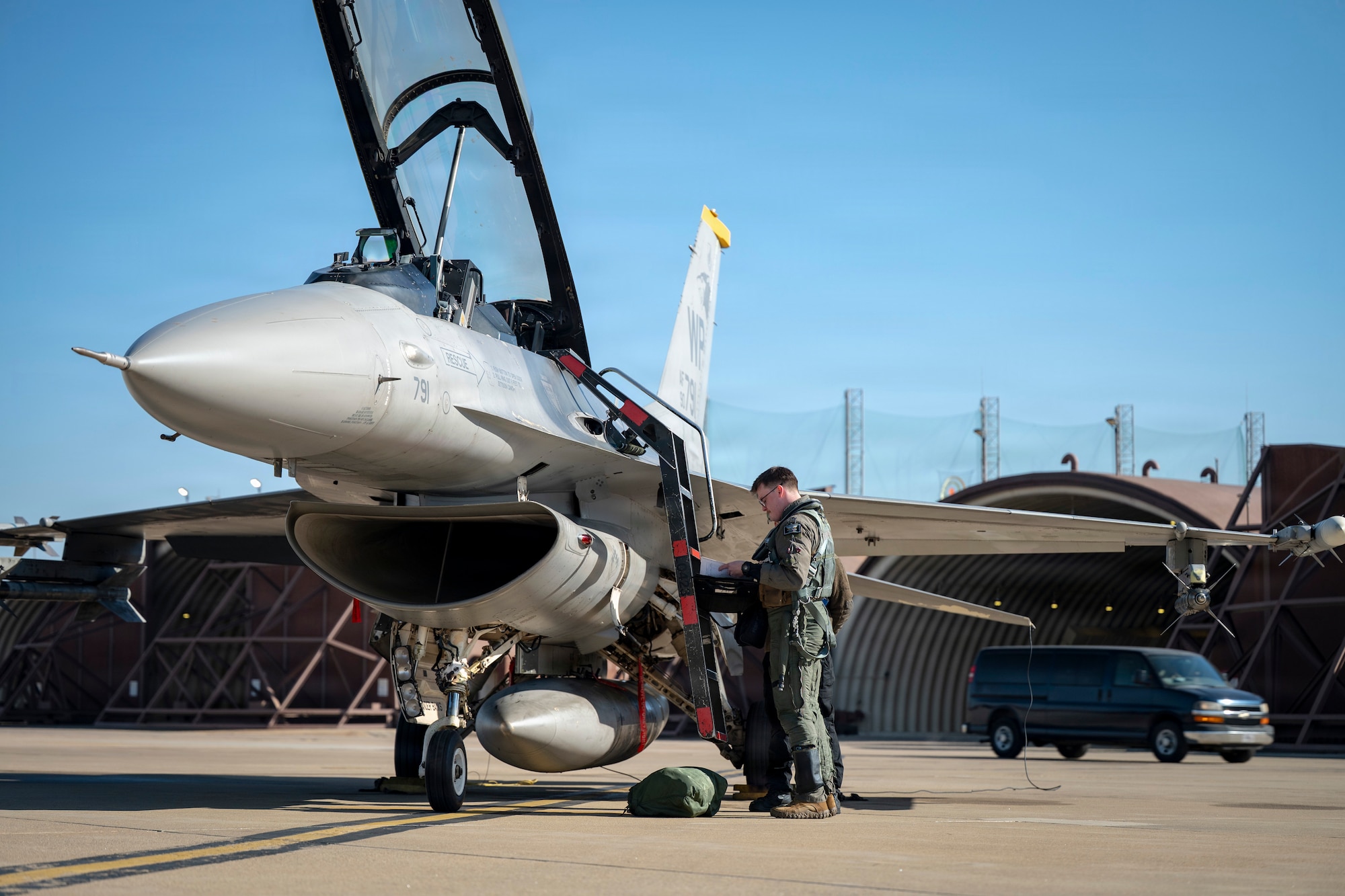 U.S. Air Force Capt. Griffin Line, 35th Fighter Squadron F-16 Fighting Falcon pilot, conducts preflight checks at Osan Air Base, Republic of Korea, Jan. 21, 2026.