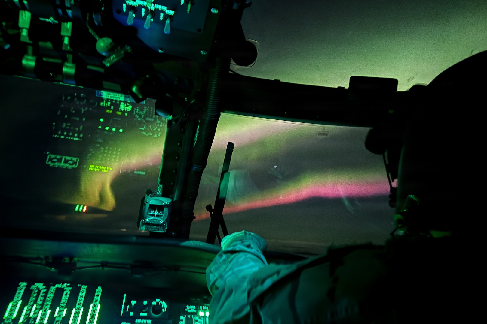 Bethel-based U.S. Army UH-60L Black Hawk aviators assigned to the 207th Aviation Troop Command, Alaska Army National Guard, fly under the Northern Lights while responding to a medical evacuation request in Western Alaska, Jan. 21, 2026.