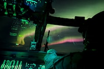 Bethel-based U.S. Army UH-60L Black Hawk aviators assigned to the 207th Aviation Troop Command, Alaska Army National Guard, fly under the Northern Lights while responding to a medical evacuation request in Western Alaska, Jan. 21, 2026.