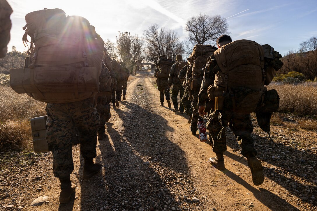 U.S. Marines conduct a movement during a Cold Weather Field Exercise at Fort Hunter-Liggett, Calif. on Jan. 10th, 2026. The Marines are a part of Combat Logistics Battalion 23, 4th Marine Logistics Group. CLB-23 conducted a hike to transfer from one training area to another, designed to enhance and test readiness and lethality in the Marine Corps Reserve. (U.S Marine Corps photo by Sgt. Eduardo Delatorre)