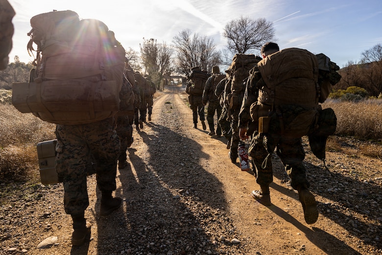 U.S. Marines conduct a movement during a Cold Weather Field Exercise at Fort Hunter-Liggett, Calif. on Jan. 10th, 2026. The Marines are a part of Combat Logistics Battalion 23, 4th Marine Logistics Group. CLB-23 conducted a hike to transfer from one training area to another, designed to enhance and test readiness and lethality in the Marine Corps Reserve. (U.S Marine Corps photo by Sgt. Eduardo Delatorre)